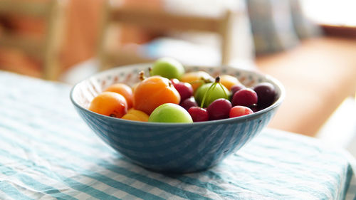 Close-up of fruits in bowl on table