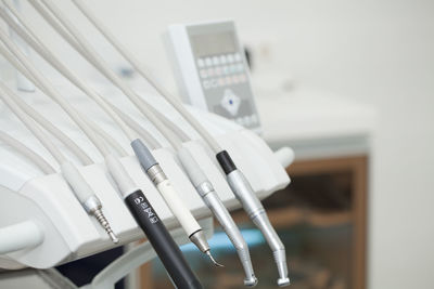 Close-up of dental equipment on table