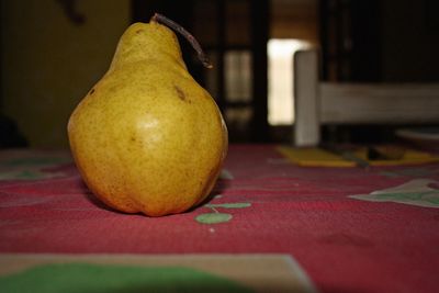 Close-up of apple on table