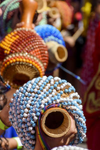 Close-up of multi colored hats for sale