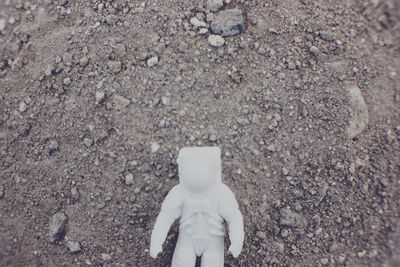 Close-up of figurine on ground
