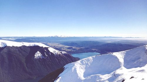 Scenic view of snow covered mountains