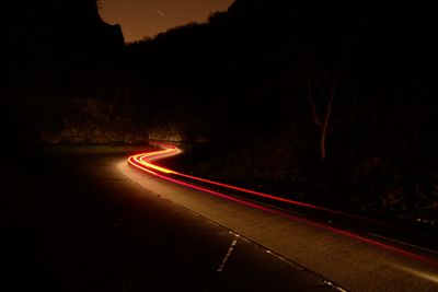 Light trails on road at night