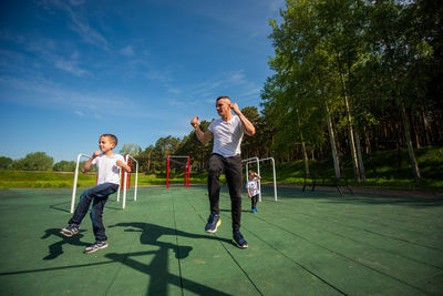 Full length of boy on swing