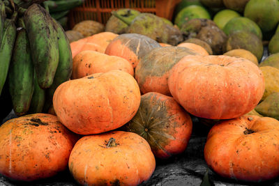 High angle view of pumpkins for sale at market stall