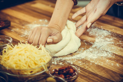 Midsection of man preparing food