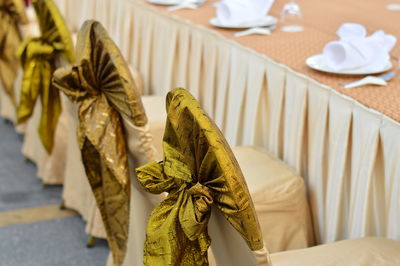 Close-up of yellow leaf on table