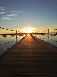 View of pier at sunset