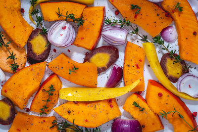 High angle view of chopped fruits in plate