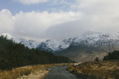 Scenic view of mountains against sky during winter