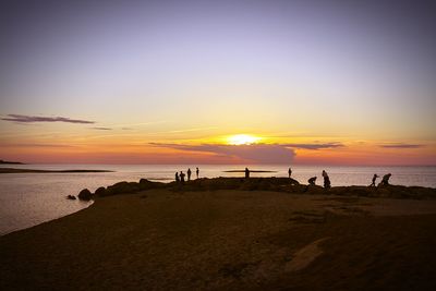 Scenic view of sea at sunset