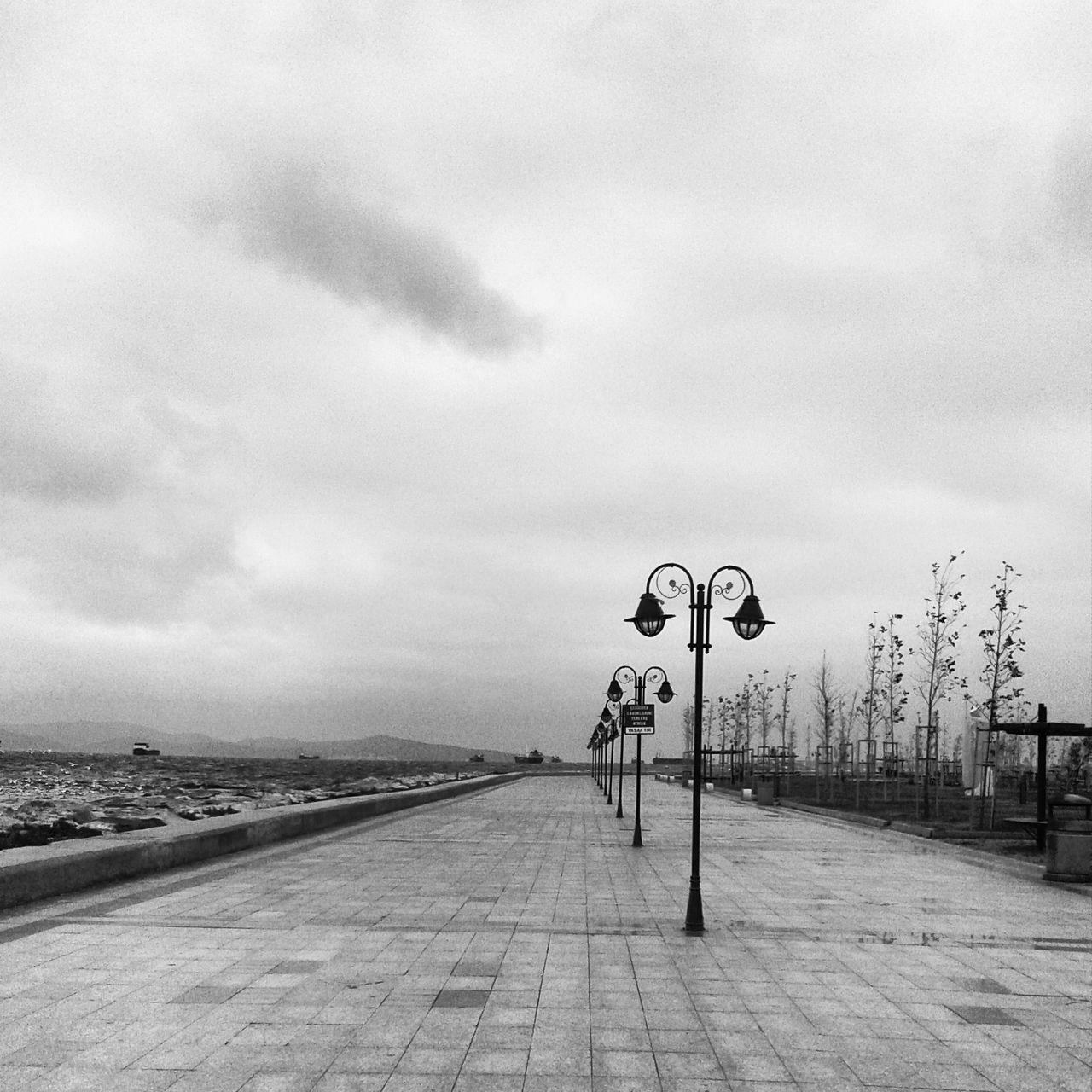 the way forward, sky, road, cloud - sky, diminishing perspective, transportation, empty, cloudy, vanishing point, street, cloud, street light, footpath, road marking, overcast, tranquility, outdoors, day, long, tranquil scene