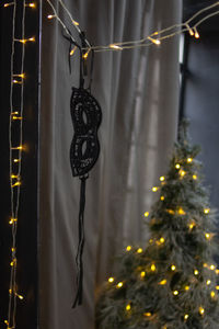 Close-up of illuminated christmas tree at night