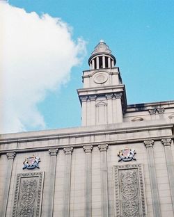 Low angle view of church against blue sky