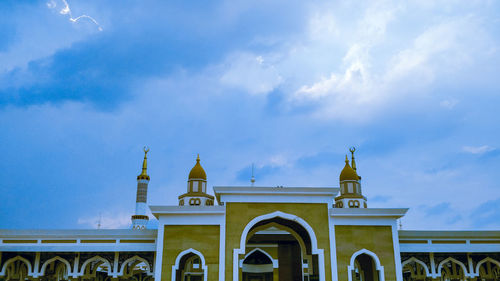 View of building against cloudy sky