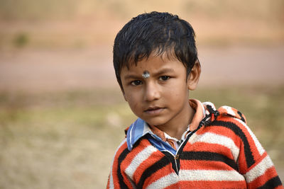 Close-up portrait of innocent boy