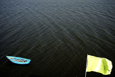 High angle view of flag on boat in sea