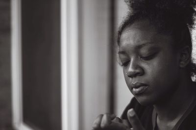 Close-up of woman looking away