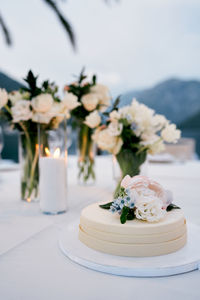 Close-up of wedding rings on table