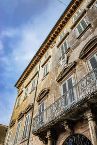 Low angle view of old building against sky