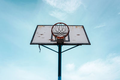 Street basketball hoop and blue sky