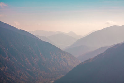 Scenic view of mountains against sky during sunset