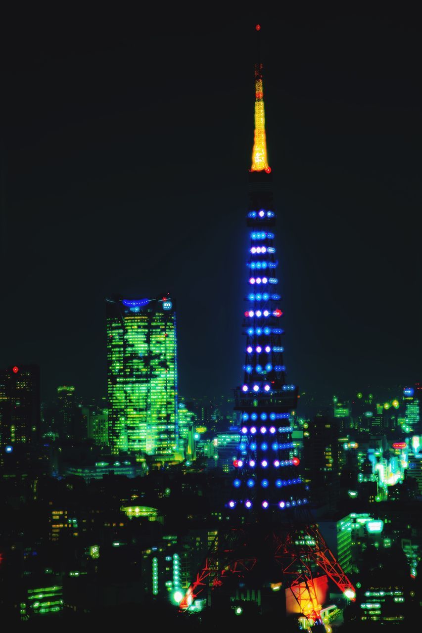 ILLUMINATED BUILDINGS AT NIGHT