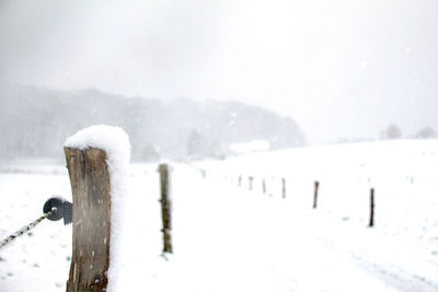 Close-up of snow on landscape