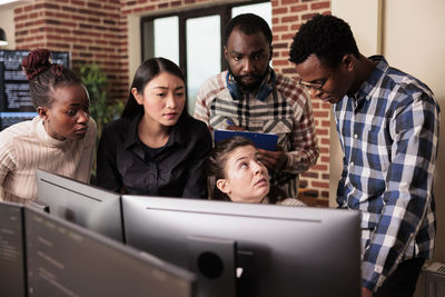 Business colleagues working in office