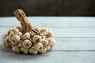 Close-up of garlic on table