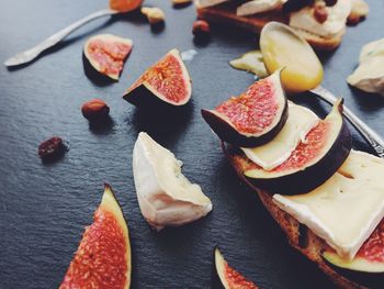 High angle view of fruits in plate on table