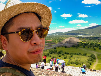 Portrait of young man wearing sunglasses