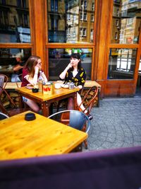 Woman sitting in a restaurant