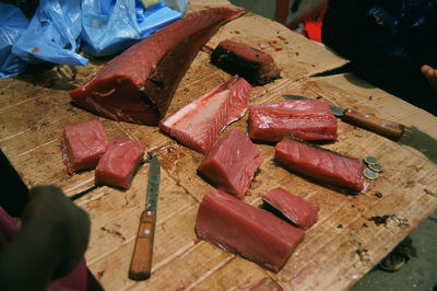 High angle view of chopped tuna on cutting board