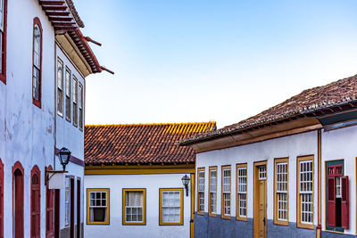 Houses against clear sky