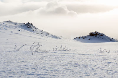 Scenic view of snow mountains against sky