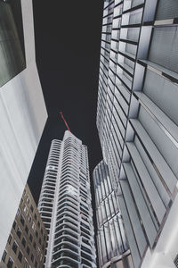 Low angle view of modern buildings in city