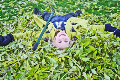 Full length of woman in grass in field