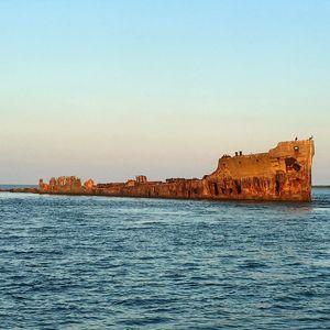 Scenic view of sea against clear sky