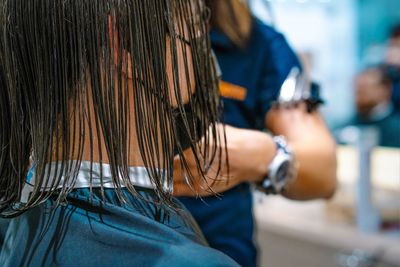 Man getting haircut at salon