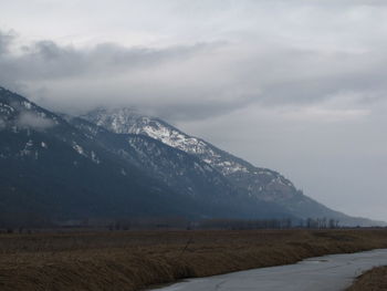 Scenic view of mountains against sky during winter