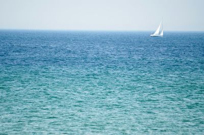 Boat sailing in sea