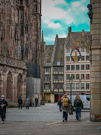 People in front of historic building