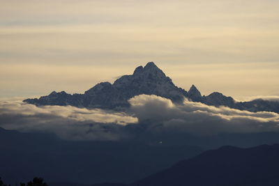 Scenic view of mountains against sky during sunset
