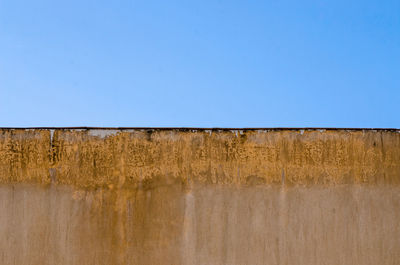 Mold wall blue sky weathered