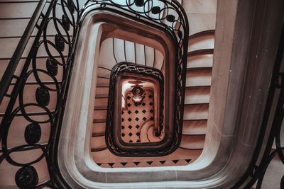 Directly below shot of spiral staircase of building