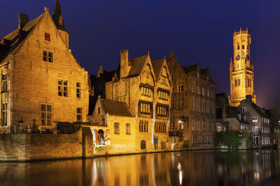 Buildings in city at night