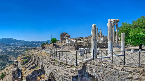 Panoramic view of historical building against blue sky