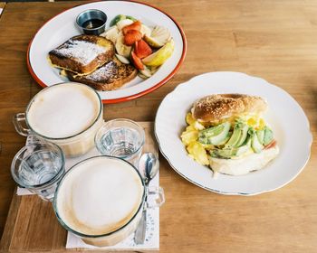 High angle view of breakfast served on table