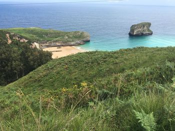 High angle view of sea shore against sky